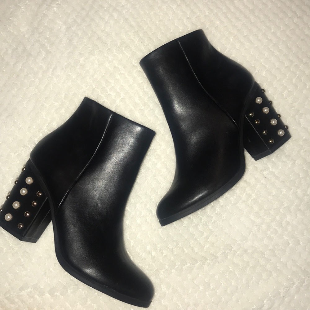 Express brand ankle length black boots.